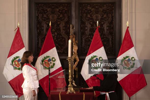 Dina Boluarte, Peru's president, left, and Nelly Paredes del Castillo, Peru's new agriculture minister, attend a cabinet swearing in ceremony at the...