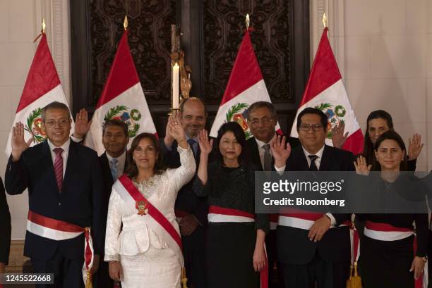 Dina Boluarte, Peru's president, second left, and her cabinet ministers during a swearing in ceremony at the Government Palace in Lima, Peru, on...