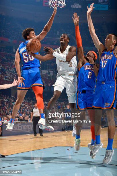 Caris LeVert of the Cleveland Cavaliers drives to the basket against the Oklahoma City Thunder on December 10, 2022 at Rocket Mortgage FieldHouse in...