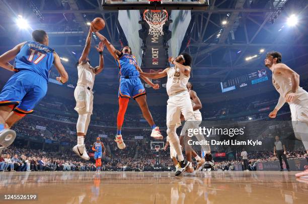 Jeremiah Robinson-Earl of the Oklahoma City Thunder drives to the basket against the Cleveland Cavaliers on December 10, 2022 at Rocket Mortgage...