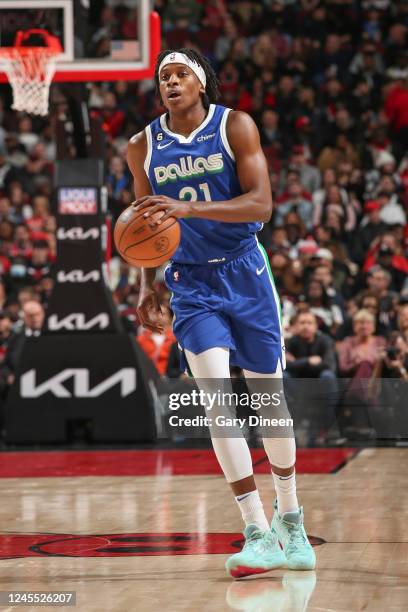 Frank Ntilikina of the Dallas Mavericks handles the ball during the game against the Chicago Bulls on December 10, 2022 at United Center in Chicago,...