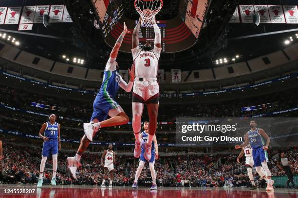 Andrew Drummond of the Chicago Bulls slam dunk during the game against the Dallas Mavericks on December 10, 2022 at United Center in Chicago,...