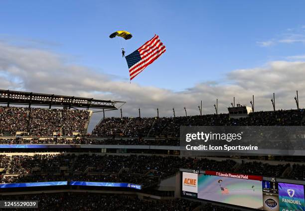 Navy Leapfrog parachutes into the stadium at the start of the 123rd playing of the Army Navy game on December 10, 2022 at Lincoln Financial Field in...