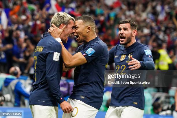 Kylian Mbappe of France celebrates Olivier Giroud of France goal with Antoine Griezmann of France and Theo Hernandez of France during the FIFA World...