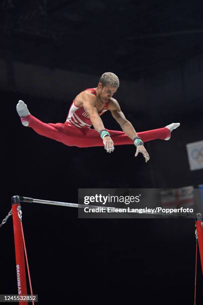 David Huddleston of Bulgaria competing on horizontal bar in the men's qualifying competition during the World Artistic Gymnastics Championships at...