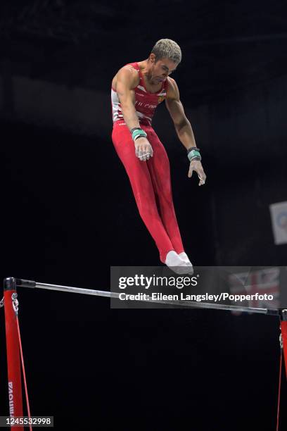 David Huddleston of Bulgaria competing on horizontal bar in the men's qualifying competition during the World Artistic Gymnastics Championships at...