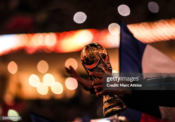 Replica World Cup Trophy is seen during the FIFA World Cup Qatar 2022 quarter final match between England and France at Al Bayt Stadium on December...