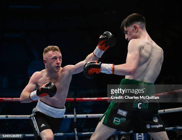 Conor Quinn in the green shorts and Stephen Jackson , black shorts pictured during their Flyweight contest at Odyssey Arena on December 10, 2022 in...