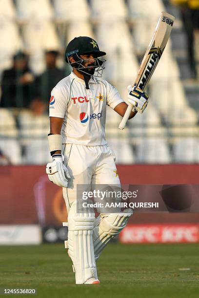 Pakistan's Saud Shakeel celebrates after scoring half century during the third day of the second cricket Test match between Pakistan and England at...