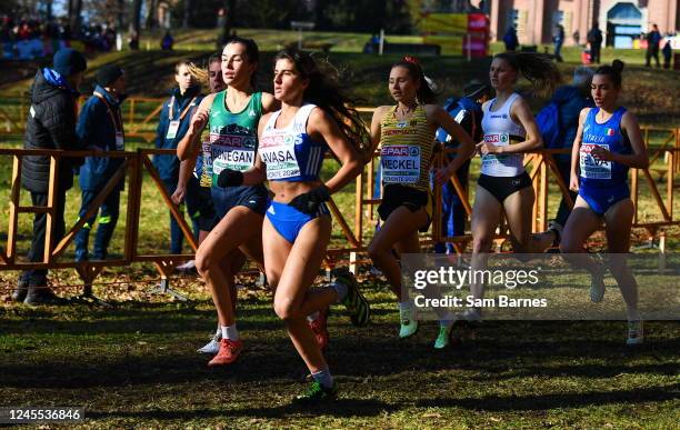 Piemonte , Italy - 11 December 2022; Danielle Donegan of Ireland, left, competing in the U23 Women's 6500m during the SPAR European Cross Country...