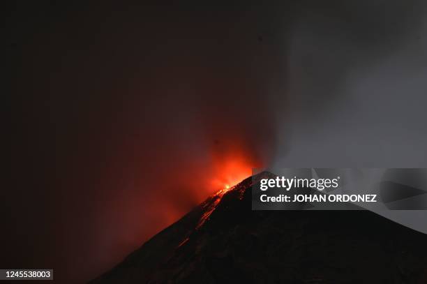 The Fuego volcano erupts, as seen from Alotenango, a municipality in Sacatepequez department 65 kilometers southwest of Guatemala City on December...