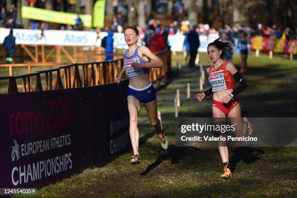 Maria Forero of Spain and Innes Fitgerald of Great Britain compete during the U20 Women race during the SPAR European Cross Country Championships...