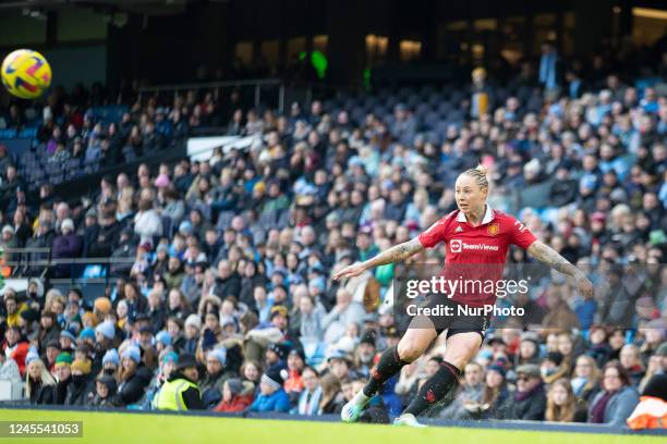 Leah Galton of Manchester United crosses the ball during the Barclays FA Women's Super League match between Manchester City and Manchester United at...