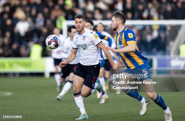 Bolton Wanderers' Dion Charles competing with Shrewsbury Town's Matthew Pennington during the Sky Bet League One between Bristol Rovers and Port Vale...