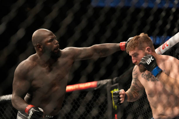 Jairzinho Rozenstruik punches Chris Daukaus in their Heavyweight fight during the UFC 282 event at T-Mobile Arena on December 10, 2022 in Las Vegas,...
