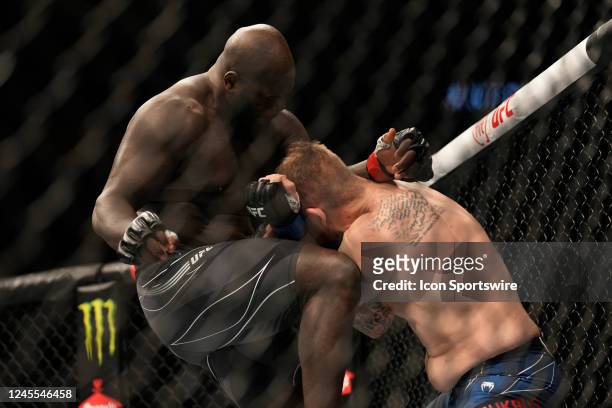 Jairzinho Rozenstruik kicks Chris Daukaus in their Heavyweight fight during the UFC 282 event at T-Mobile Arena on December 10, 2022 in Las Vegas,...