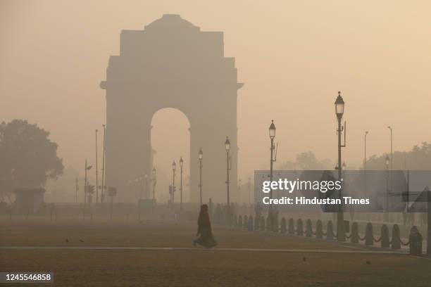 Smoggy blanket cover seen over India gate during early morning hours, on December 11, 2022 in New Delhi, India.