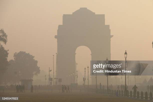 Smoggy blanket cover seen over India gate during early morning hours, on December 11, 2022 in New Delhi, India.