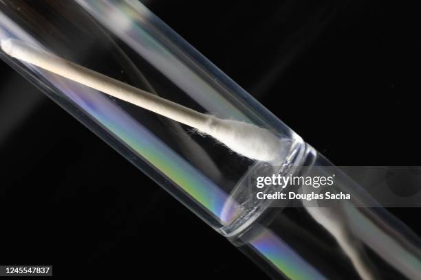 cotton swab in sealed container for dna testing - coton tige photos et images de collection