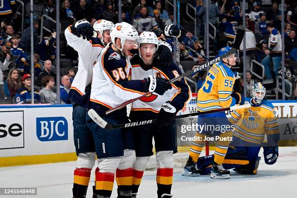 Mikko Rantanen of the Colorado Avalanche is congratulated after scoring the game winning goal in overtime against the St. Louis Blues at the...