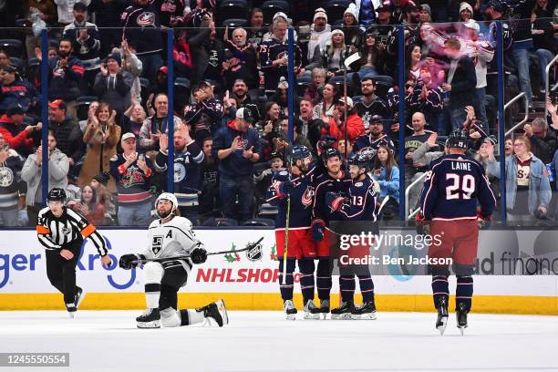 Jack Roslovic of the Columbus Blue Jackets celebrates with teammates after scoring a goal during the second period of a game against the Los Angeles...