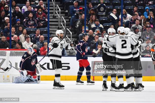 Alex Iafallo of the Los Angeles Kings celebrates with teammates after Los Angeles Kings goal during the third period of a game against the Columbus...