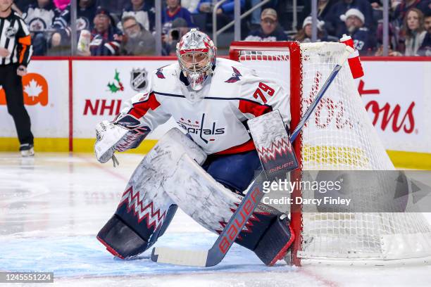 Goaltender Charlie Lindgren of the Washington Capitals guards the net during first period action against the Winnipeg Jets at the Canada Life Centre...