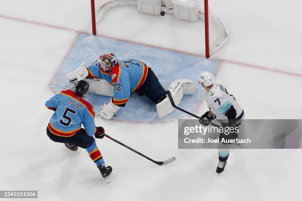 Jordan Eberle of the Seattle Kraken scores a third period goal past goaltender Sergei Bobrovsky of the Florida Panthers during third period action at...