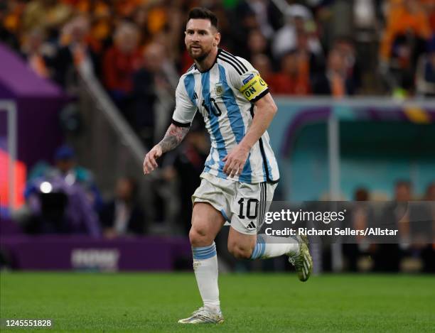 Lionel Messi of Argentina running during the FIFA World Cup Qatar 2022 quarter final match between Netherlands and Argentina at Lusail Stadium on...