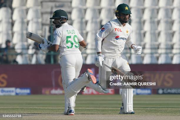 Pakistan's Faheem Ashraf and Saud Shakeel run between the wickets during the fourth day of the second cricket Test match between Pakistan and England...