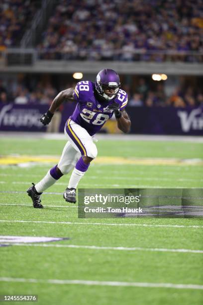 Minnesota Vikings running back Adrian Peterson runs a route during an NFL football game between the Green Bay Packers and the Minnesota Vikings...