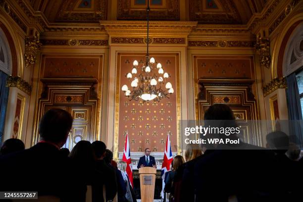 Foreign Secretary James Cleverly speaks to members of the press at the Foreign & Commonwealth Office on December 12, 2022 in London, England. The...