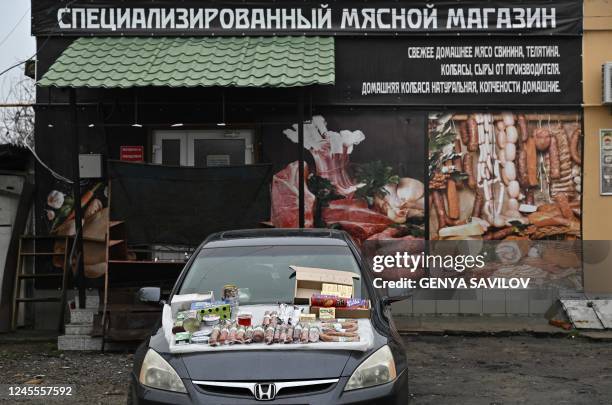 This photograph shows a meat store at a market in the town of Ochakiv on December 10 amid the Russian invasion of Ukraine. - In the far north of the...