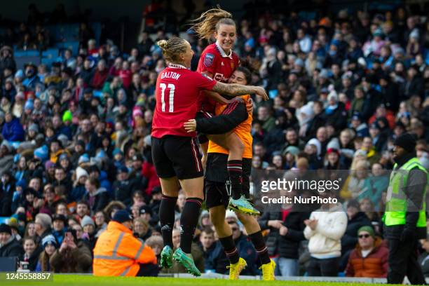 Leah Galton of Manchester United celebrates her goal with team-mates during the Barclays FA Women's Super League match between Manchester City and...
