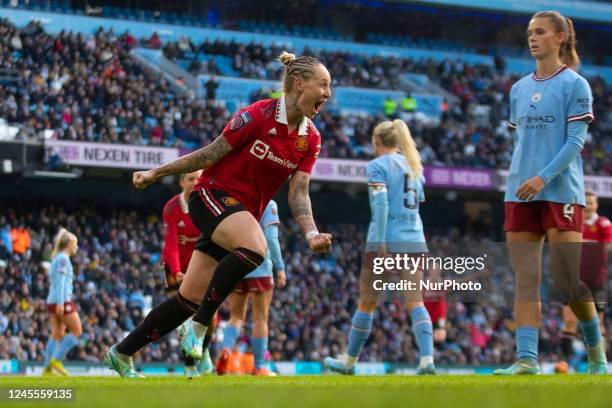 Leah Galton of Manchester United celebrates her goal with team-mates during the Barclays FA Women's Super League match between Manchester City and...