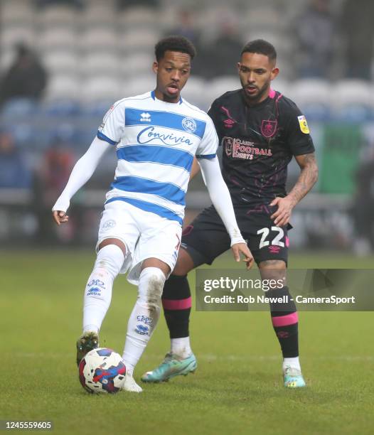 Queens Park Rangers' Chris Willock and Burnley's Vitinho during the Sky Bet Championship between Queens Park Rangers and Burnley at Loftus Road on...