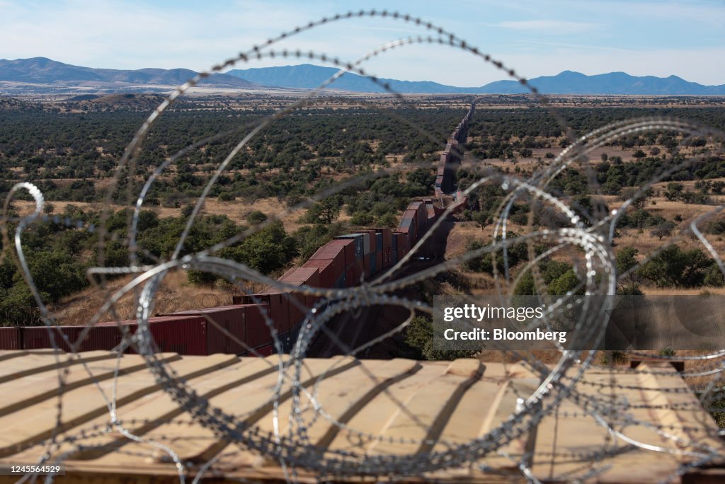 Razor Infested Containers Razor wire on top of shipping containers lining the US and Mexico ...