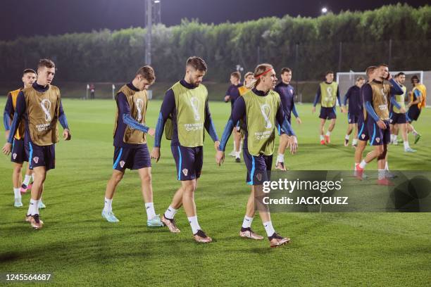 Croatia's players take part in a training session at the Al Erssal Training Site 3 in Doha on December 12 on the eve of the Qatar 2022 World Cup semi...