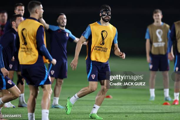 Croatia's defender Josko Gvardiol takes part in a training session at the Al Erssal Training Site 3 in Doha on December 12 on the eve of the Qatar...