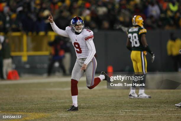 Lawrence Tynes of New York Giants celebrates his game winning field goal against the Green Bay Packers at the NFC Championship game at Lambeau Field...