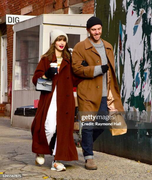 Lily Collins and Charlie McDowell are seen in SoHo on December 12, 2022 in New York City.