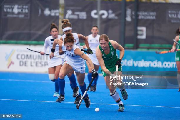 Teresa Dalla Vittoria of Italy and Kathryn Mullan of Ireland seen in action during the FIH Hockey Womens Nations Cup Spain 2022 at Poliesportiu...