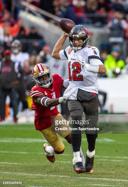 Tampa Bay Buccaneers quarterback Tom Brady throws a pass, defended by San Francisco 49ers defensive back Jimmie Ward , in the third quarter of an NFL...