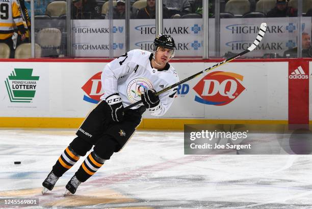 Evgeni Malkin of the Pittsburgh Penguins wears a Pride Night jersey in honor of Pride Night prior to the game against the Dallas Stars at PPG PAINTS...