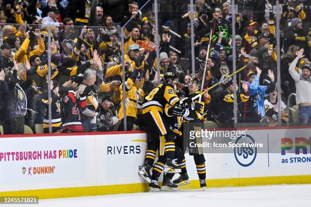 Pittsburgh Penguins Center Evgeni Malkin celebrates his game-winning goal during the third period in the NHL game between the Pittsburgh Penguins and...