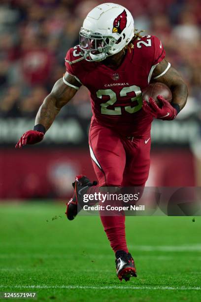 Corey Clement of the Arizona Cardinals carries the ball against the New England Patriots during the first half at State Farm Stadium on December 12,...
