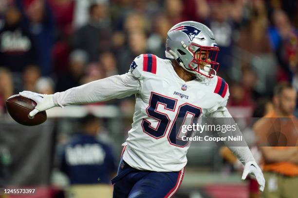 Raekwon McMillan of the New England Patriots celebrates after scoring a touchdown against the Arizona Cardinals during the second half at State Farm...