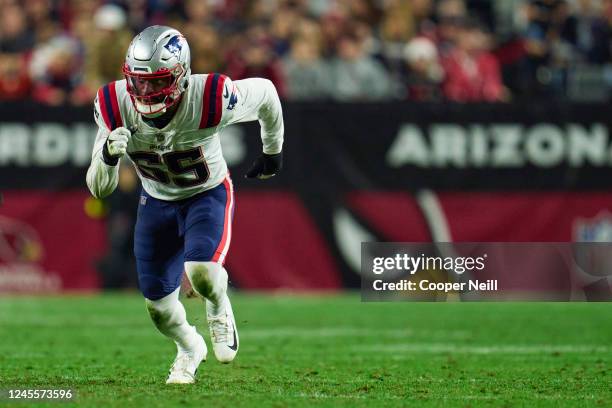 Josh Uche of the New England Patriots rushes the passer against the Arizona Cardinals during the second half at State Farm Stadium on December 12,...
