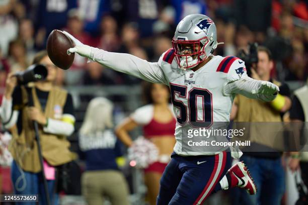 Raekwon McMillan of the New England Patriots celebrates after scoring a touchdown against the Arizona Cardinals during the second half at State Farm...