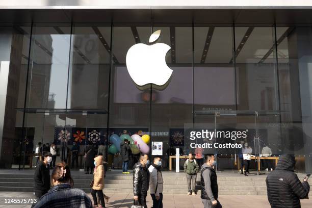 The location code has been removed from the front of an Apple Store in Shanghai, China, December 13, 2022. Customers no longer need to scan the...